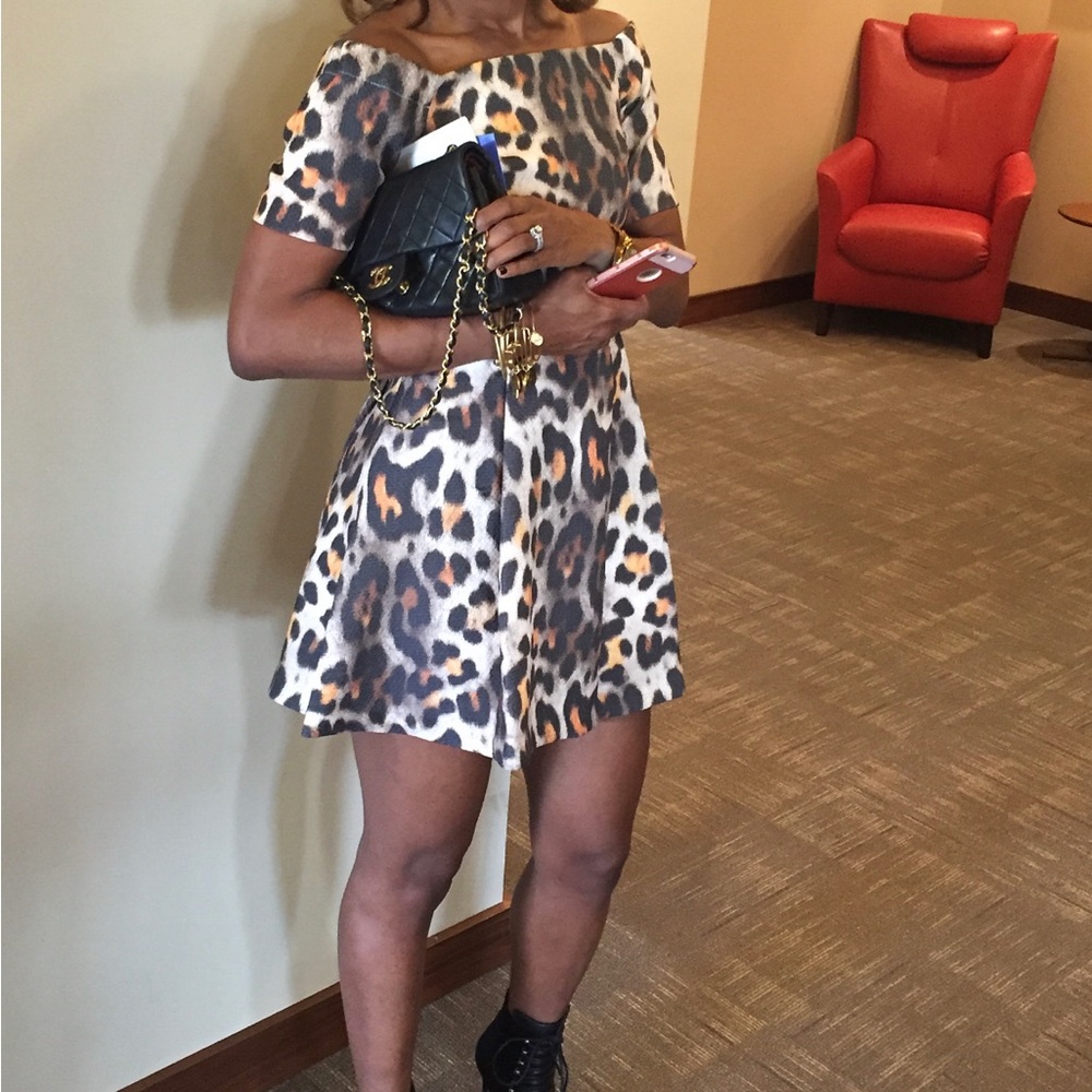 H&M Animal print off the shoulder skater dress. Side zip.